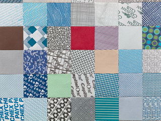 Illustration for article titled You'd Never Guess These Quilts Are Made From 1000s of Envelopes
